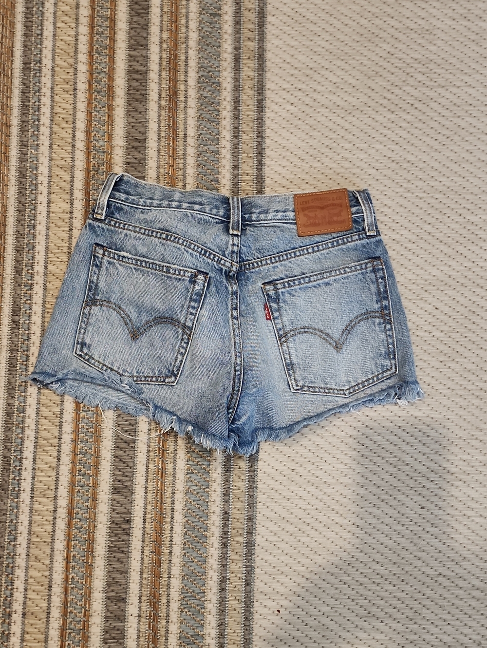 Levi's Light Wash Frayed Hem Denim Shorts